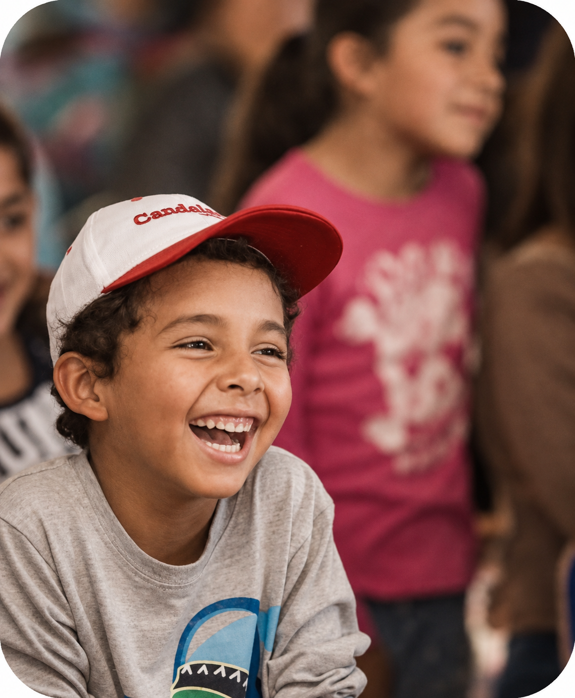 A child smiles during an activity of Festival Atacamagica