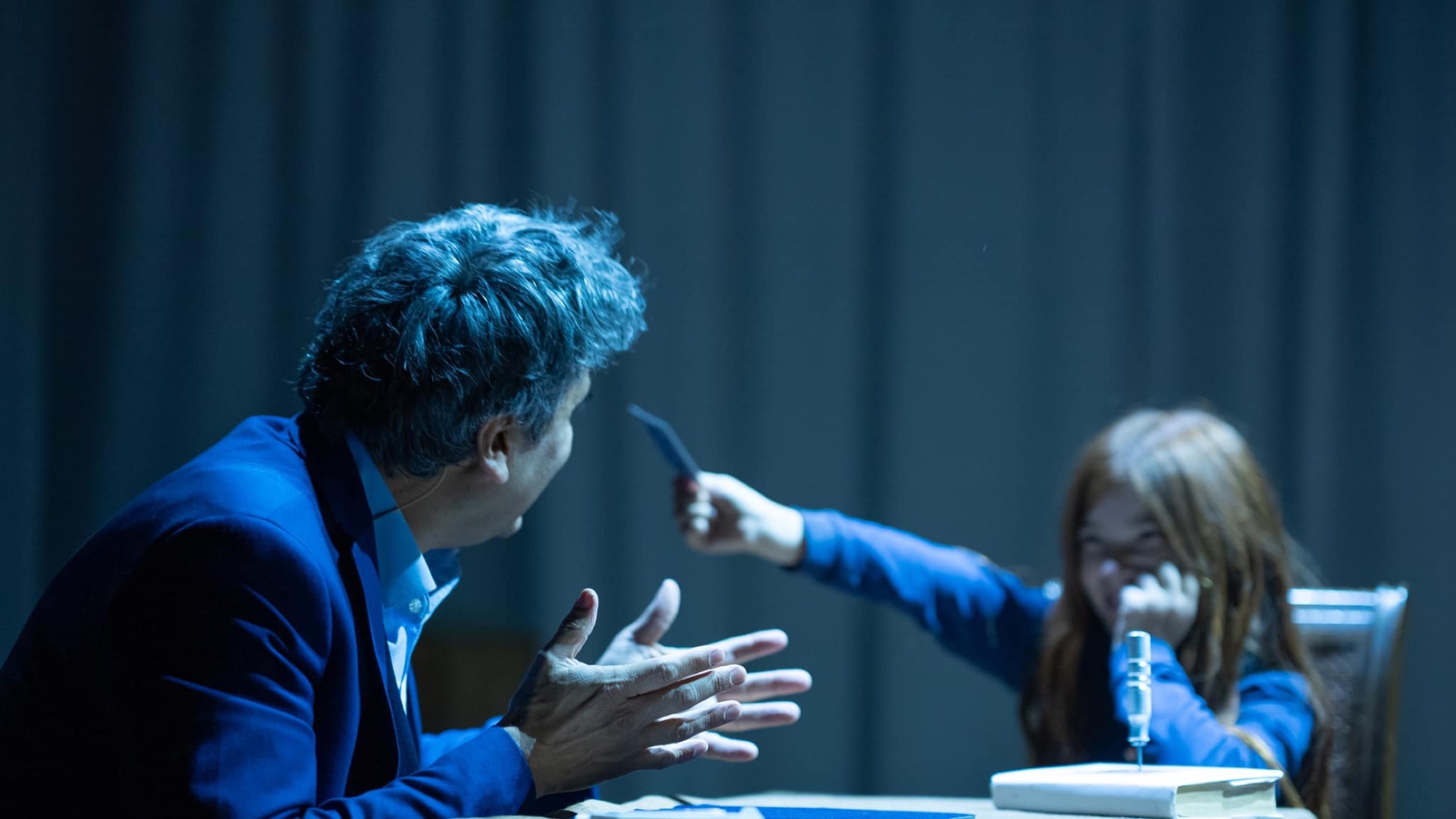 Luis Albornoz shares a scene with a spectator